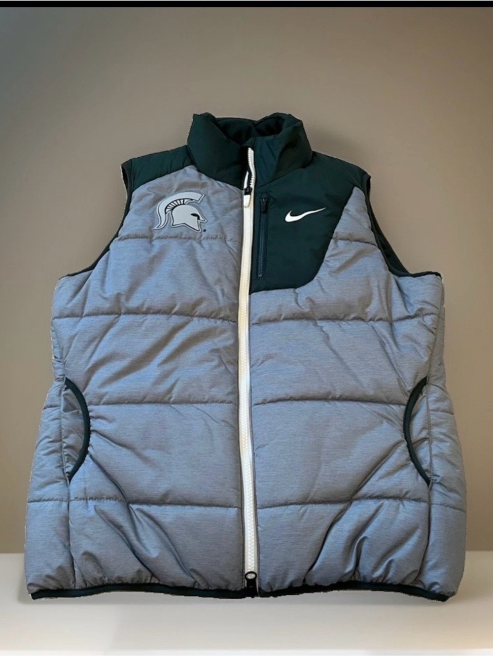 Nike Gray and Dark Green Women's Puffer Vest with Spartan Logo